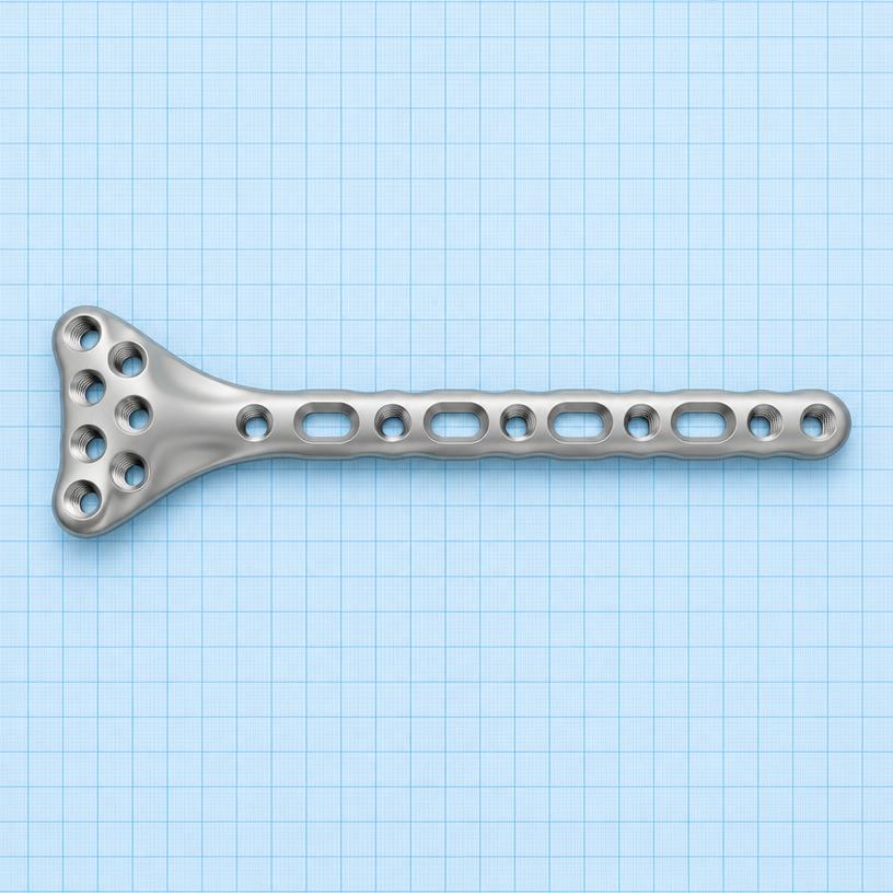Distal Femur Plate: orthopaedic implant on a light-blue graph-paper background